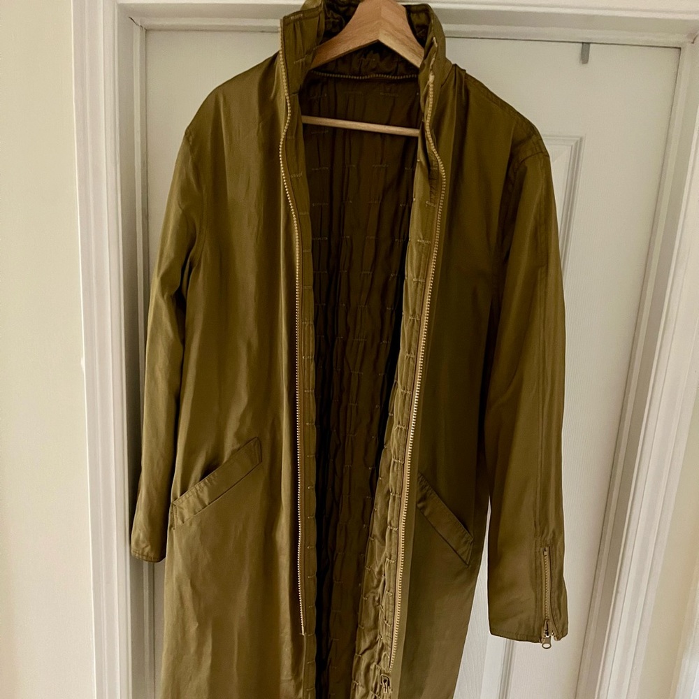 Mycra pac one designer long light jacket. Shiny olive green/gold.